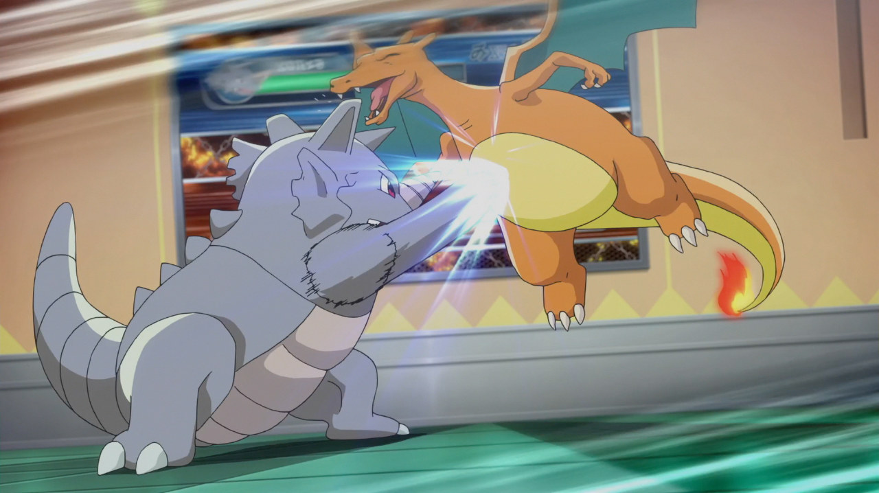 Rhydon battles Charizard - Rhydon was the first Pokemon created